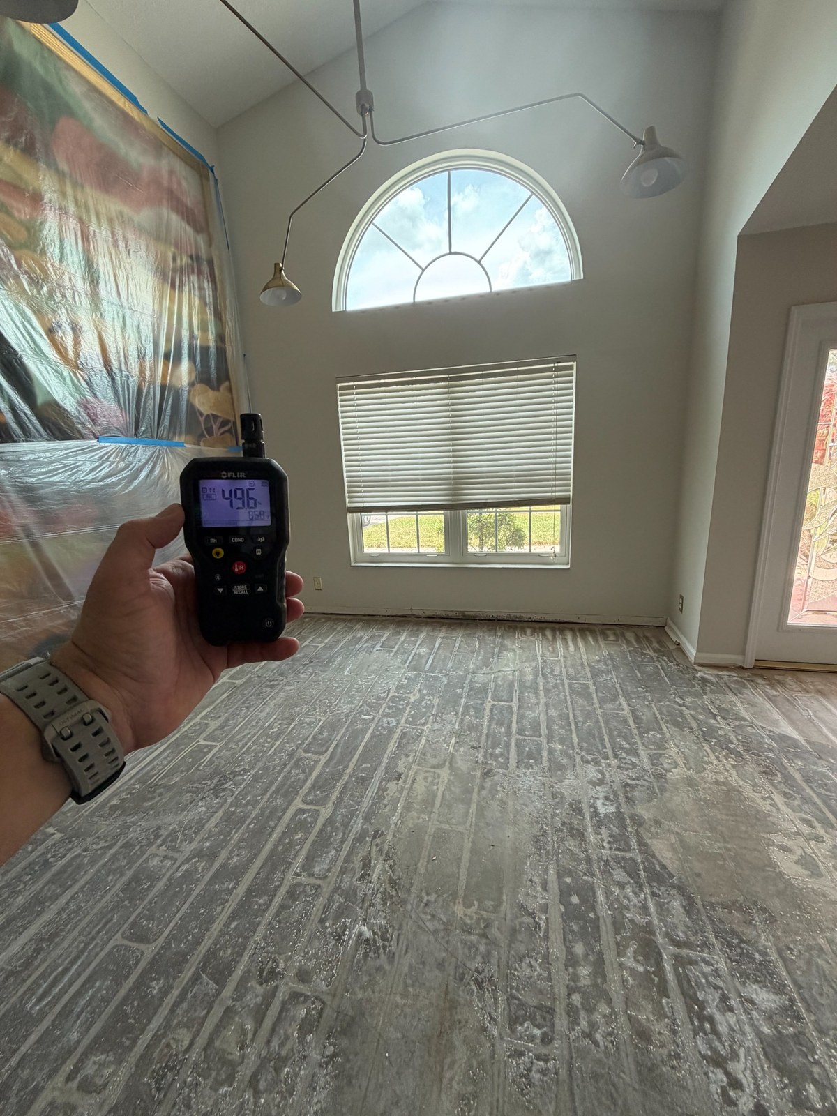 Exposed flooring and lower wall area during mold inspection in Plantation FL.