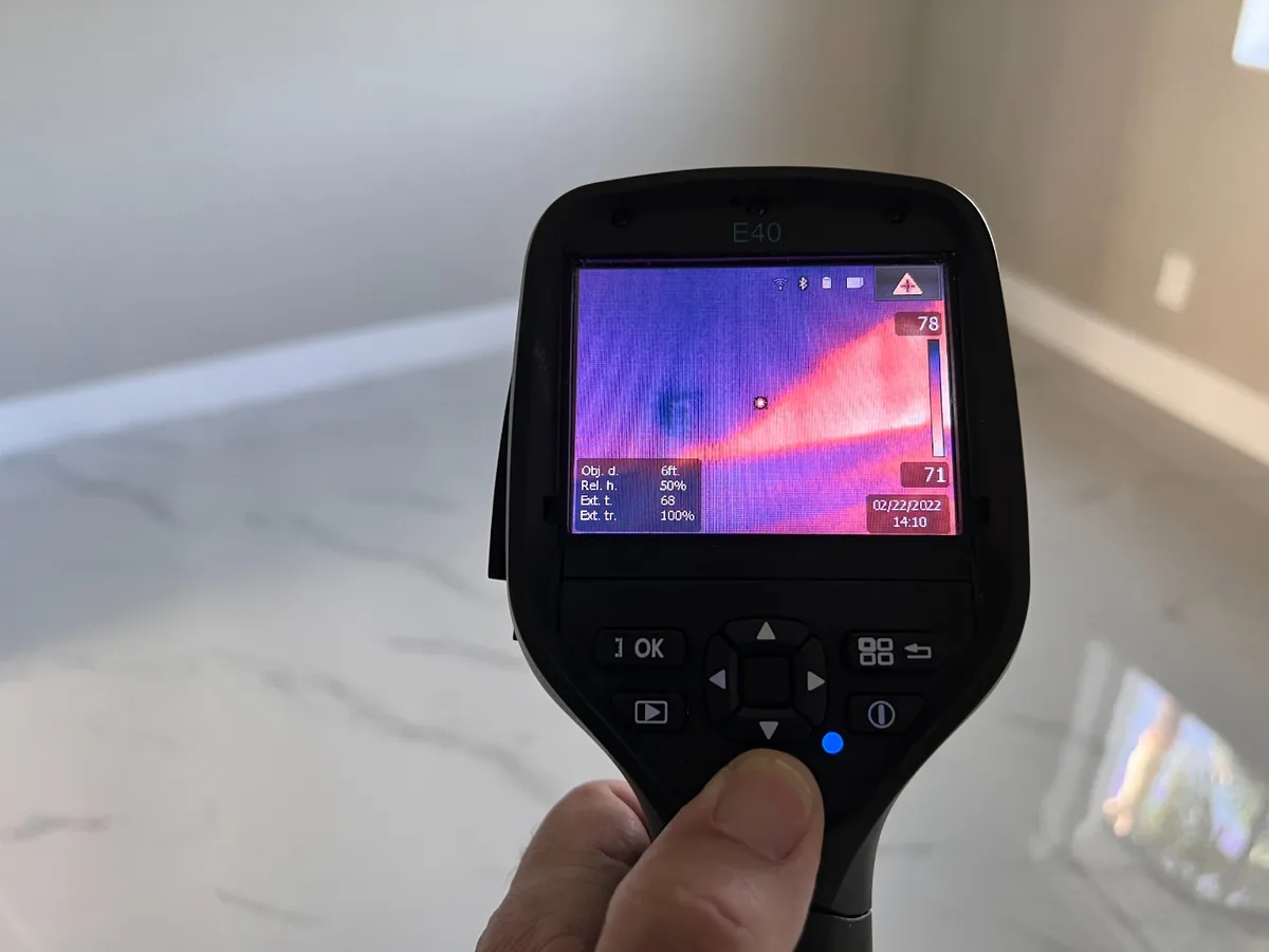 Thermal imaging reveals moisture inside exterior wall